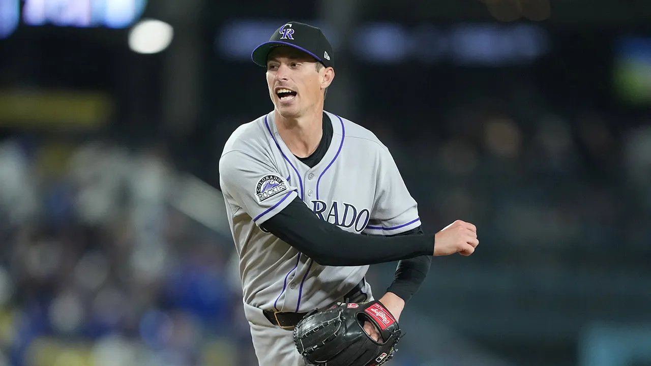Rockies relief pitcher Jimmy Herget has fun with media with humorous T-shirt