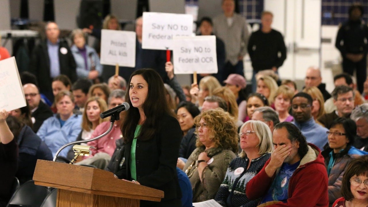 Illinois parents clash at school board over trans volleyball player